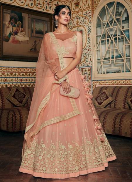 Peach Colour TEJASVEE AAKRUT Bridal Wedding Wear Heavy Net Embroidery Sequence And Dori Work Bridal Lehenga Choli Collection 1001